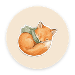 Willow the fox curled up sleeping